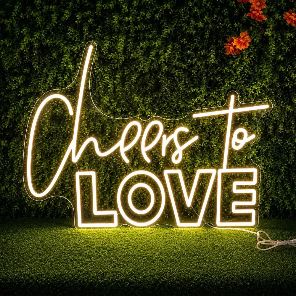 Neonschild Cheers to Love auf einer Hochzeit